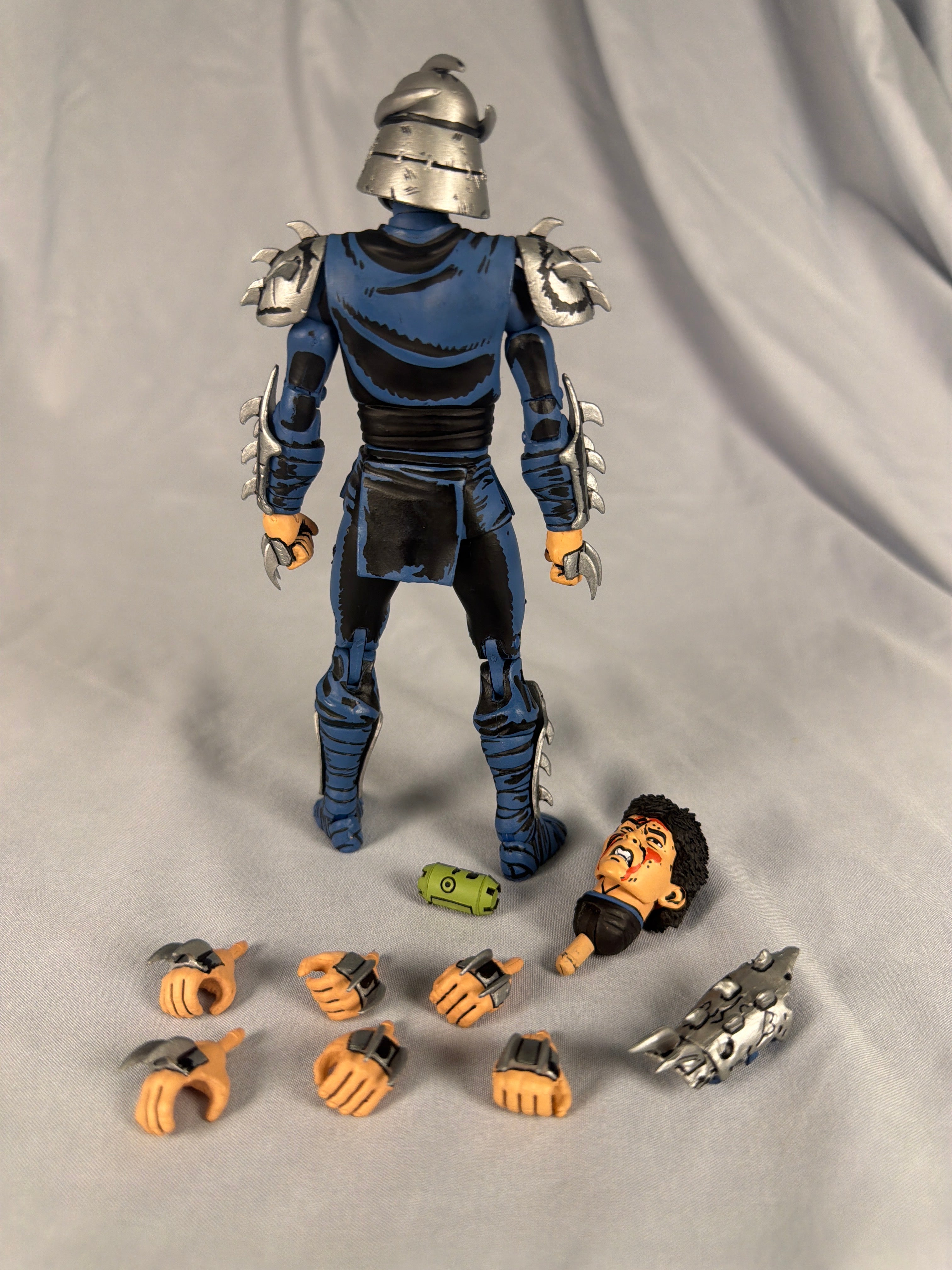 NECA Teenage Mutant Ninja Turtles TMNT Mirage Comics Blue Battle Damaged Shredder Figure